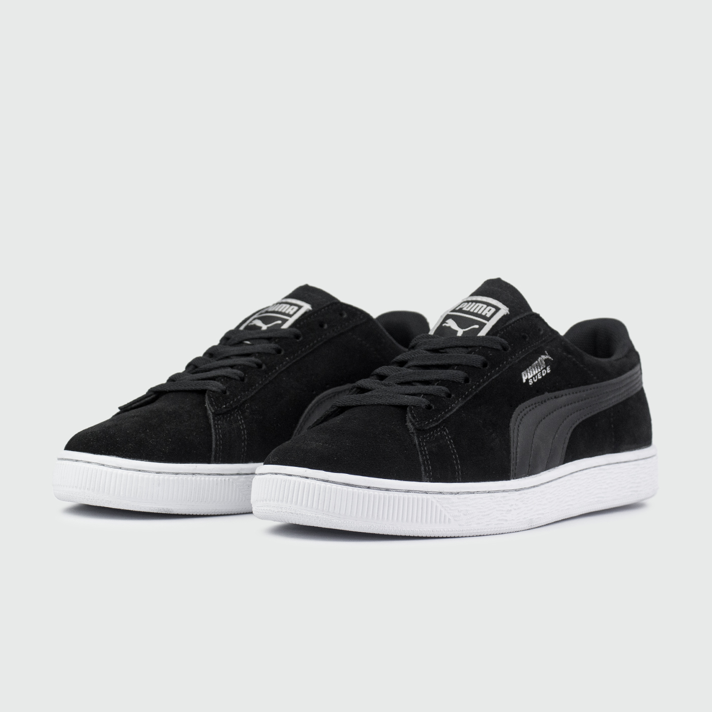 Puma black on sale white suede